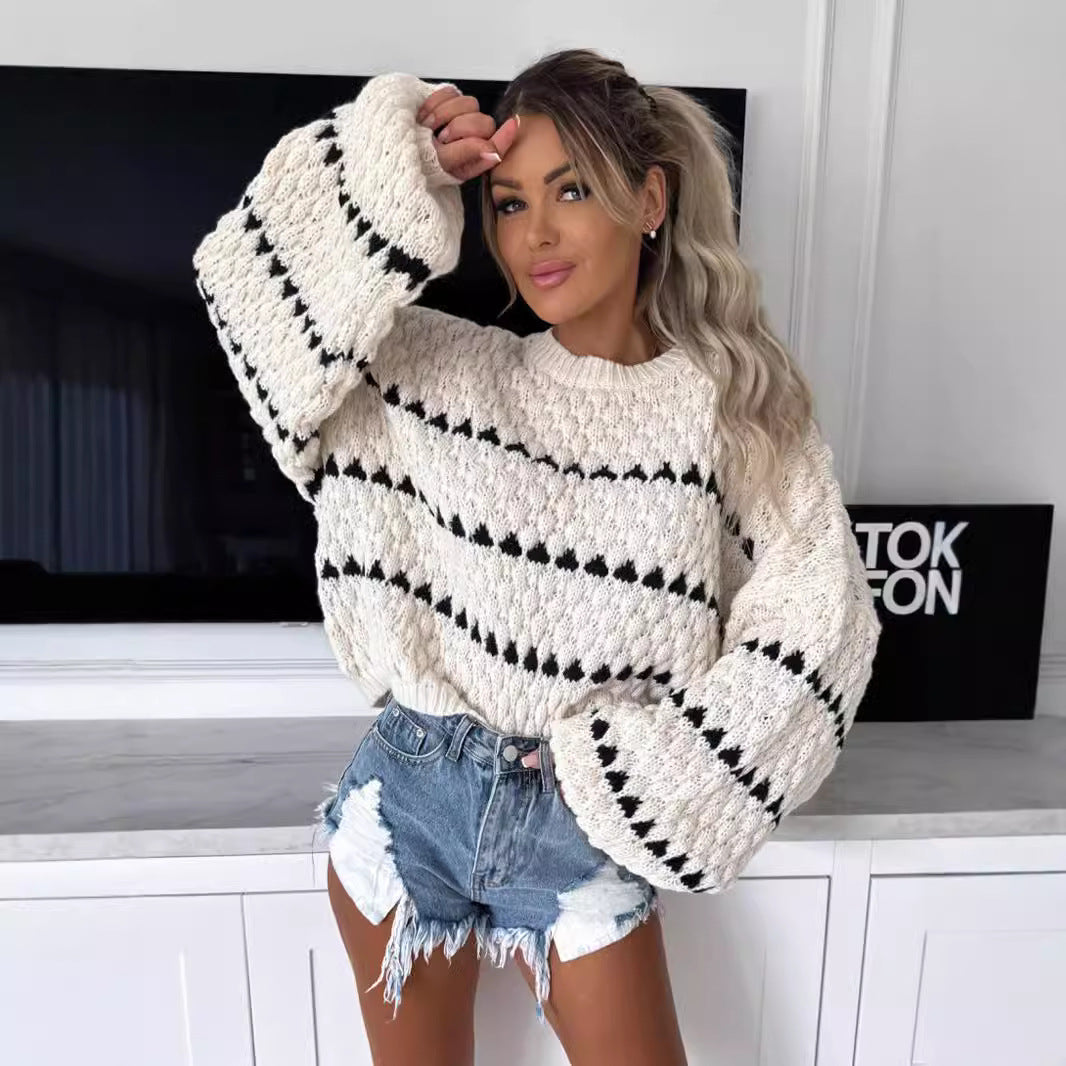Pull en gros tricot pour femmes avec des manches volumineuses et un design de tresse moderne Chic und Stil