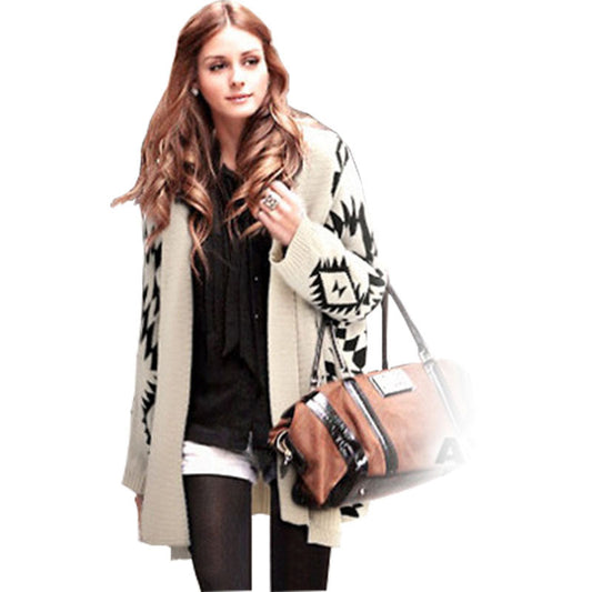 Poncho en tricot pour femmes avec un motif géométrique frappant Chic und Stil