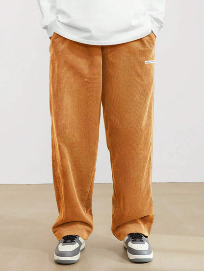 Wide corduroy pants for men with elastic waistband and practical side pockets Chic and Style