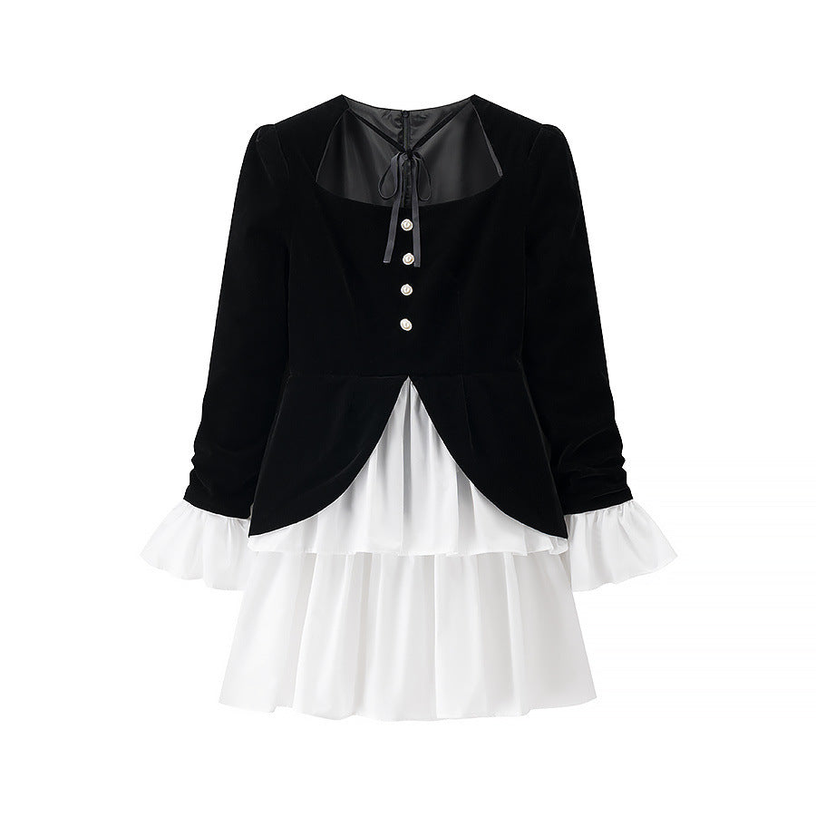 Robe de fête pour dames avec un design élégant en noir et blanc et un finissage en volants Chic und Stil