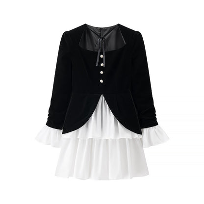 Robe de fête pour dames avec un design élégant en noir et blanc et un finissage en volants Chic und Stil