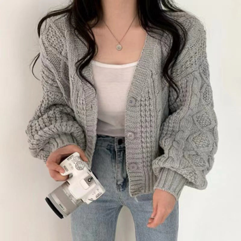 Dames gros tricot cardigan avec des manches volumineuses et une surface texturée Chic und Stil