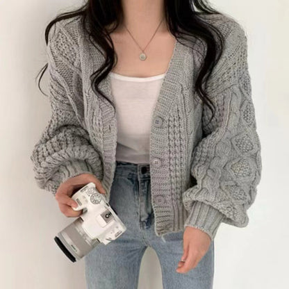 Dames gros tricot cardigan avec des manches volumineuses et une surface texturée Chic und Stil