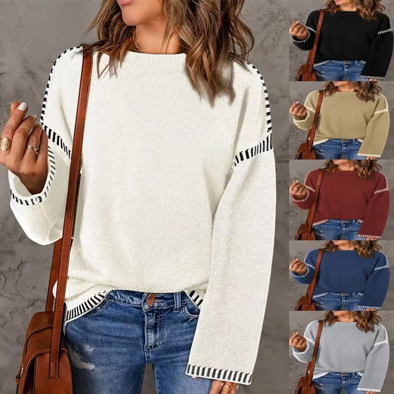 Pull féminin à la mode avec un matériau structuré et des détails en forme de rayures Chic und Stil