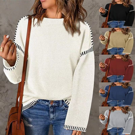 Pull féminin à la mode avec un matériau structuré et des détails en forme de rayures Chic und Stil
