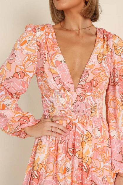 Robe d'été à motifs floraux pour femmes avec décolleté en V profond et manches bouffantes Chic und Stil