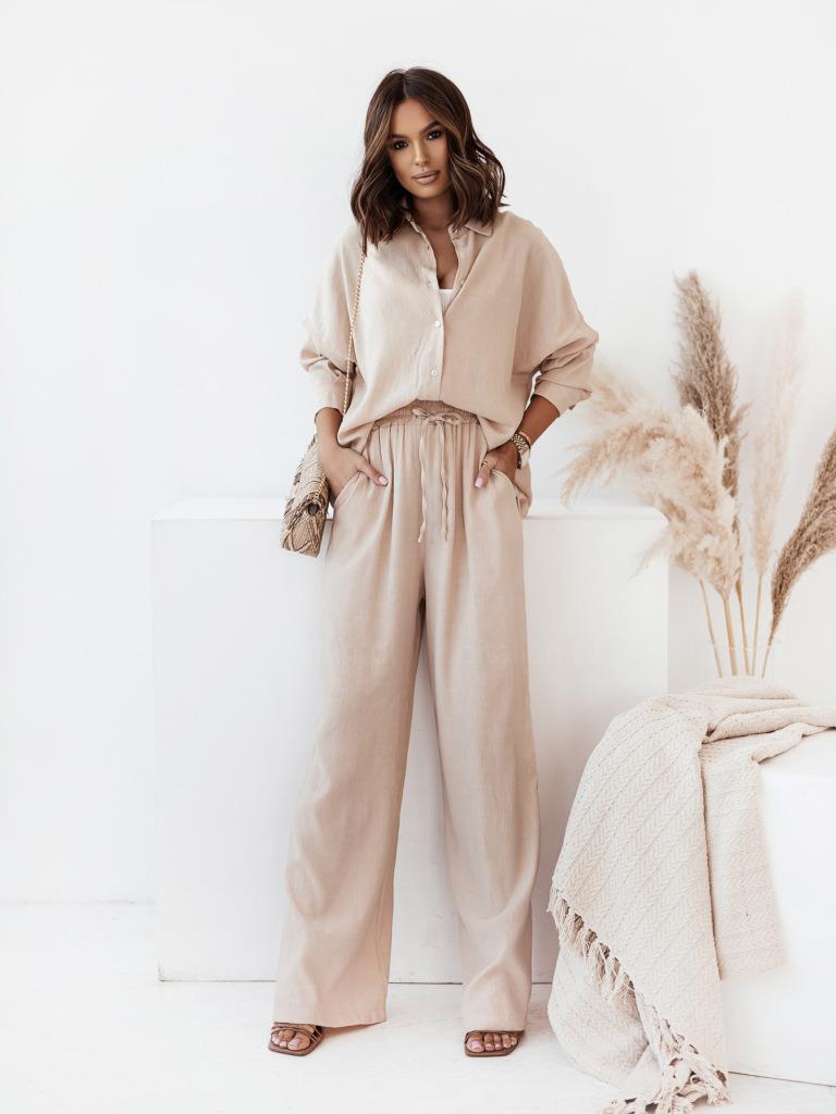 Lightweight two-piece women's set consisting of a shirt and pants with a knot at the waist Chic und Stil
