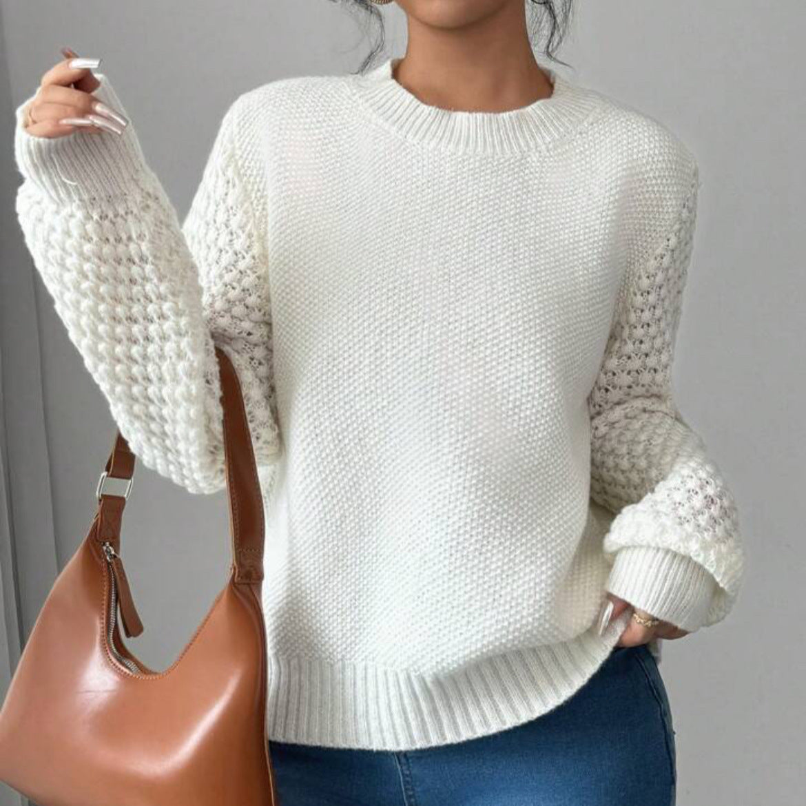 Pull féminin à la mode avec des détails en tricot raffinés Chic und Stil