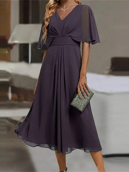 Robe midi élégante pour femmes en tissu fluide avec des manches asymétriques Chic und Stil