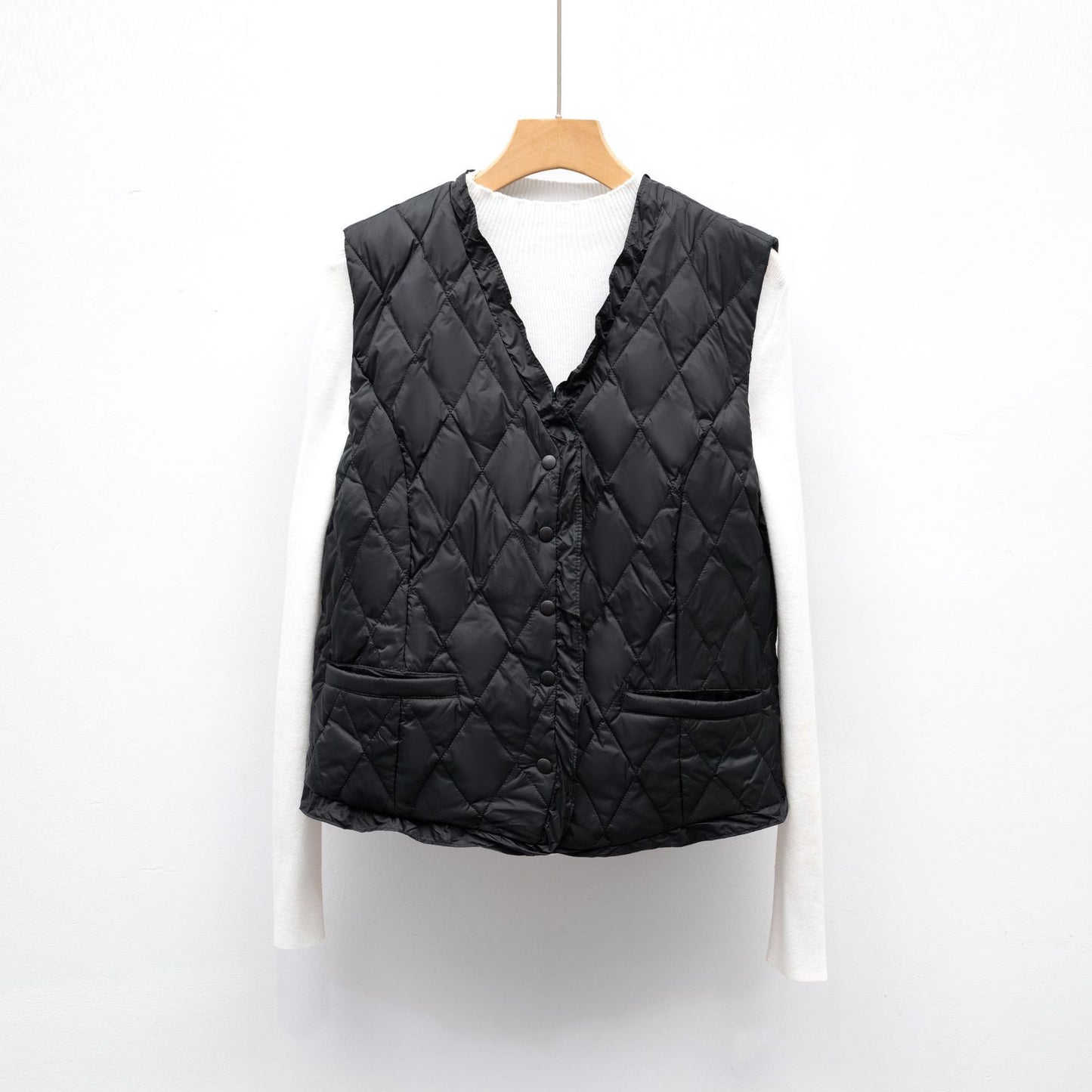 Dames gilet matelassé avec coupe asymétrique Chic und Stil