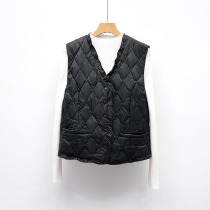 Dames gilet matelassé avec coupe asymétrique Chic und Stil