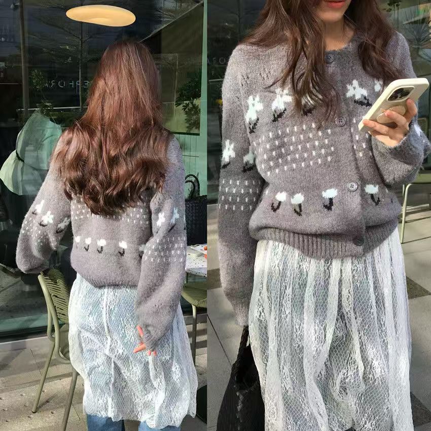 Ladies' knit jacket with playful animal print and button closure Chic und Stil