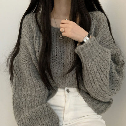 Pull en tricot décontracté pour femmes avec des manches bouffantes volumineuses et une structure en tricot ouverte Chic und Stil