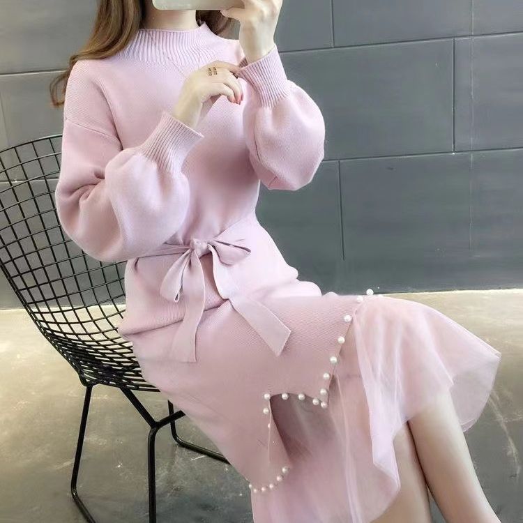 Robe tricotée élégante pour femmes avec ceinture à la taille et ourlet décoratif Chic und Stil