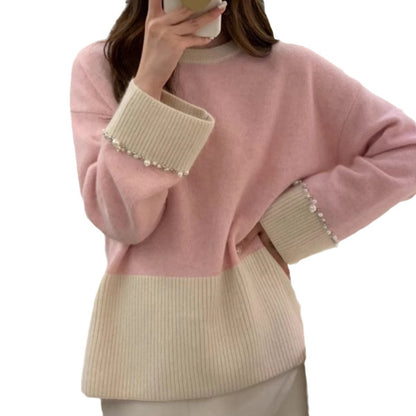 Pull en tricot à la mode pour femmes avec des manches ornées de perles Chic und Stil