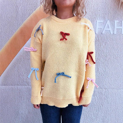 Pull créatif pour femmes avec des accents de nœuds colorés Chic und Stil