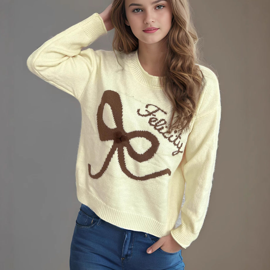 Pull femme en laine douce avec application de nœud au design ludique Chic und Stil
