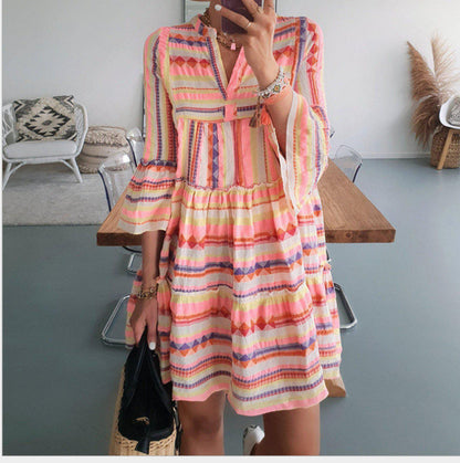 Robe portefeuille décontractée pour femmes avec des manches volumineuses et un motif graphique Chic und Stil