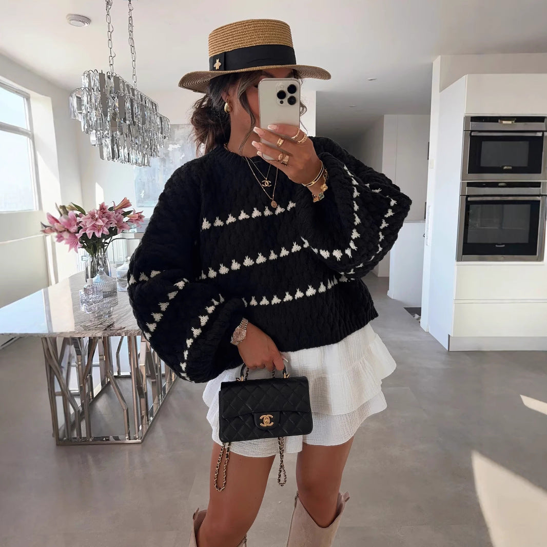 Pull féminin tendance avec une coupe ample et un design structuré Chic und Stil