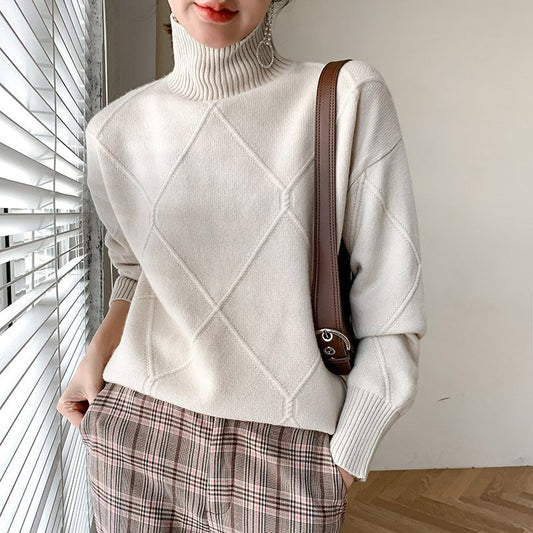 Pull en maille pour femmes avec col montant et motif losange Chic und Stil