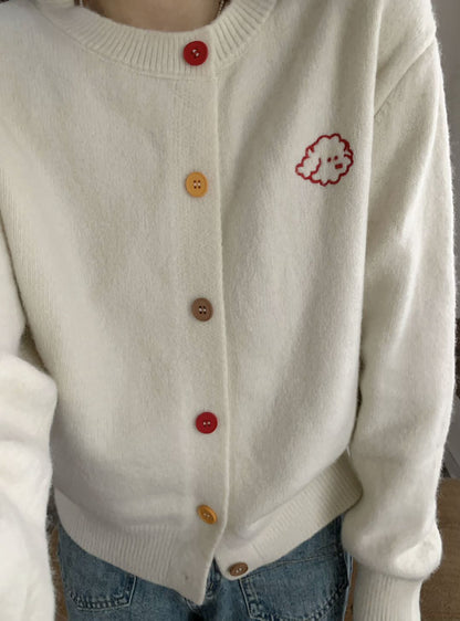 Dames pull-over en tricot douillet avec décolleté boutonné et motif brodé Chic und Stil
