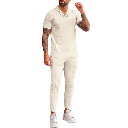 Elegant men's short sleeve polo with textured design and matching slim-fit trousers Chic and Style
