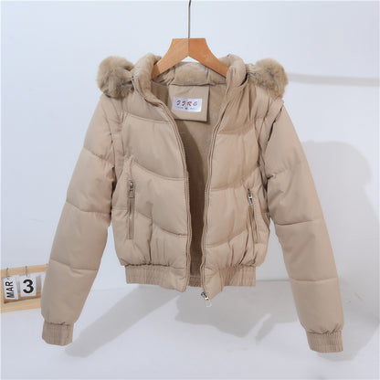 Short quilted jacket for women with removable hood and luxurious faux fur collar Chic and Style