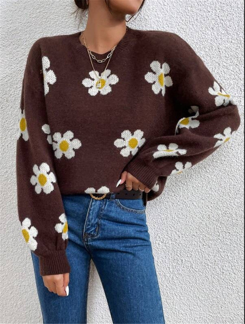 Pull en tricot pour femmes avec un motif floral ludique et des manches bouffantes élégantes Chic und Stil