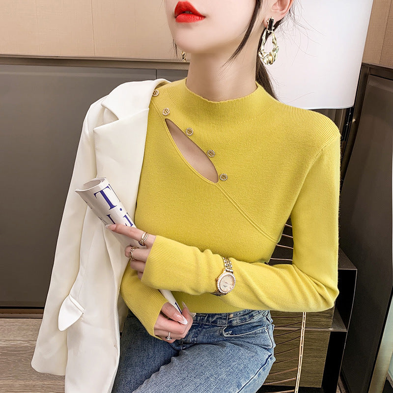 Pull élégant pour dames avec coupe asymétrique et détails de boutons Chic und Stil