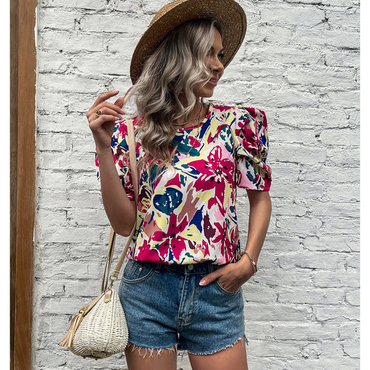 Chemisier décontracté pour femmes avec manches bouffantes et motif floral Chic und Stil