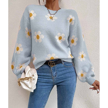 Pull femme avec motif floral et manches volumineuses Chic und Stil