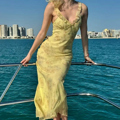 Robe maxi femme avec ornements floraux en dentelle et élégant décolleté en V Chic und Stil