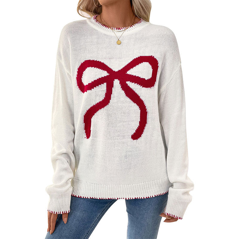 Dames pull confortable avec motif de nœud festif Chic und Stil