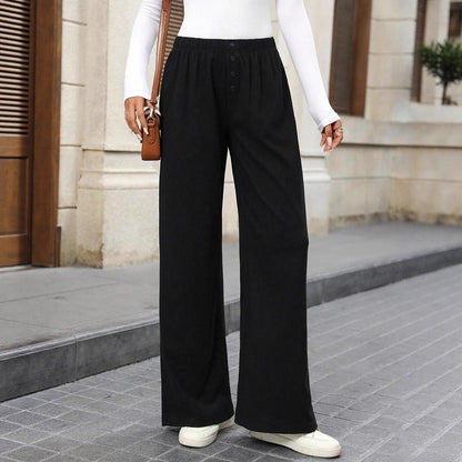 Loose fabric pants for women with a button row and elastic waist Chic and Style