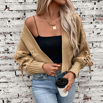 Veste tricotée à la mode pour femmes avec des manches volumineuses et un motif en cable Chic und Stil