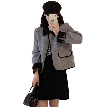 Dame élégante veste courte avec des détails contrastants Chic und Stil