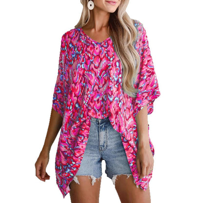 Blouse de plage décontractée pour femmes avec coupe asymétrique et motif coloré Chic und Stil