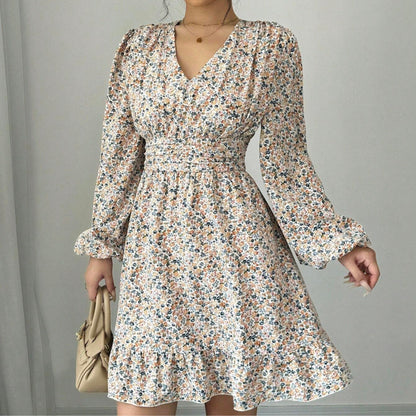 Robe mini ornée de fleurs pour femmes avec décolleté en V profond et manches volumineuses Chic und Stil
