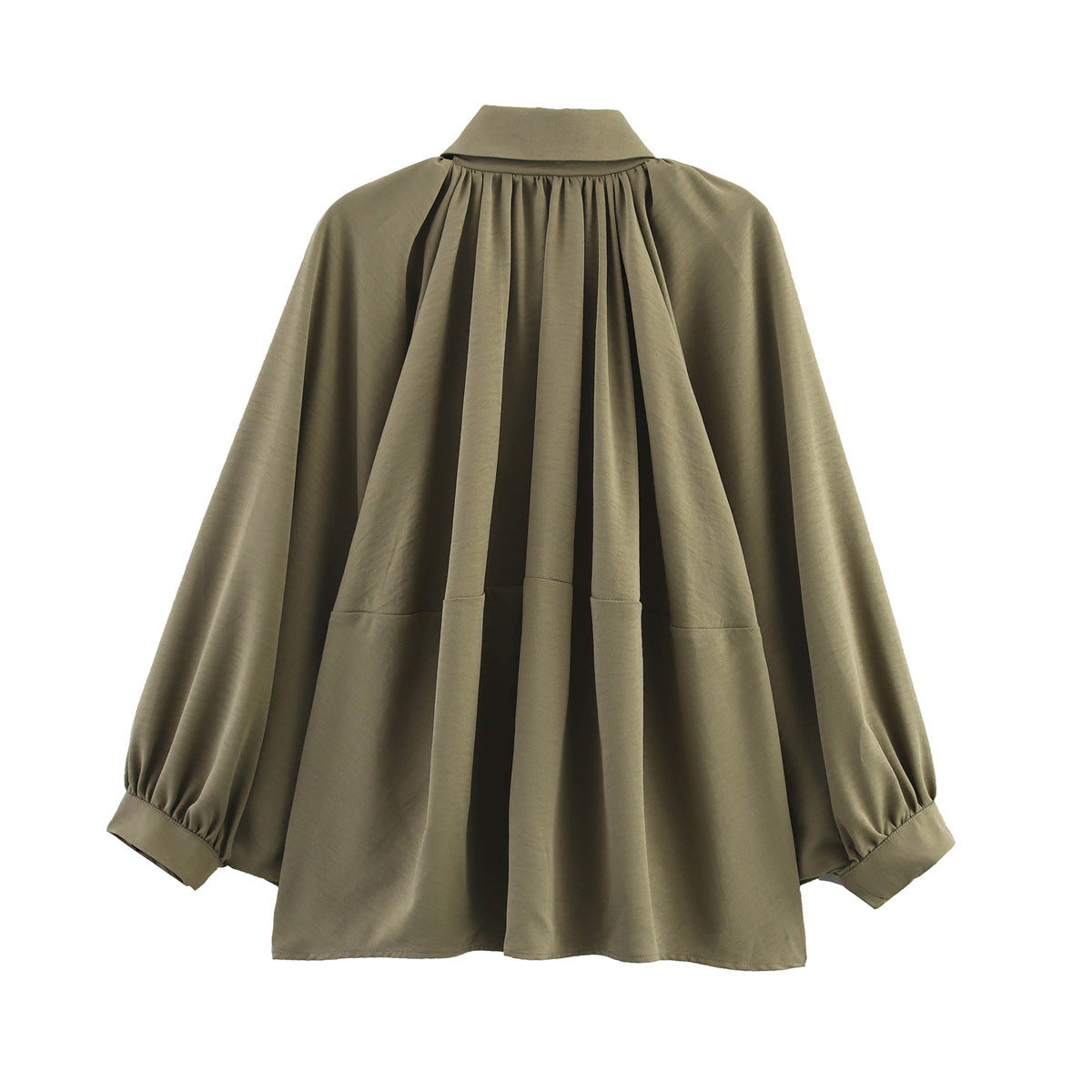 Chemisier oversized pour femmes avec des drapés raffinés et un élégant détail de bouton Chic und Stil