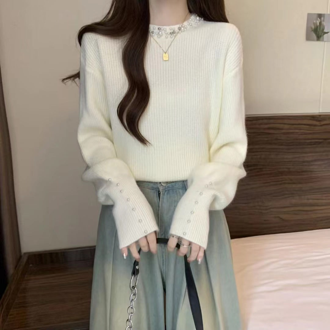 Dames pull élégant avec des détails ornés de perles Chic und Stil