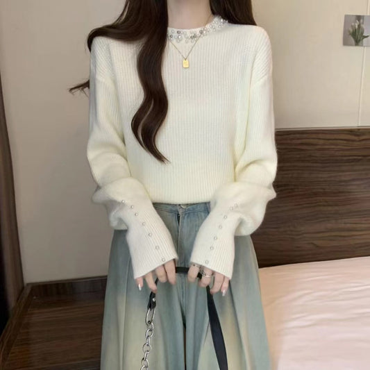 Dames pull élégant avec des détails ornés de perles Chic und Stil