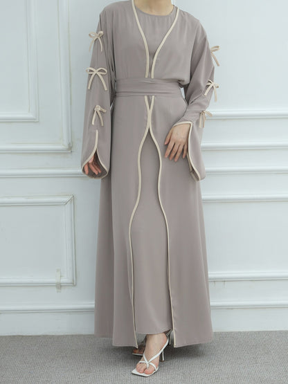 Robe maxi femme avec des détails de nœud élégants et une coupe fluide Chic und Stil