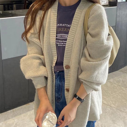 Dames gilet en tricot confortable avec épaules tombantes et détails de boutons Chic und Stil