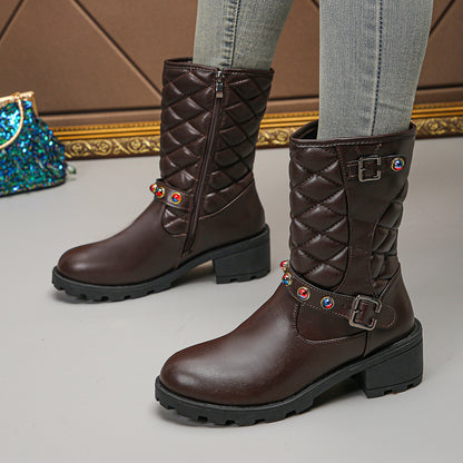 Bottes mode pour dames avec des détails décoratifs en bijou et un profil robuste Chic und Stil