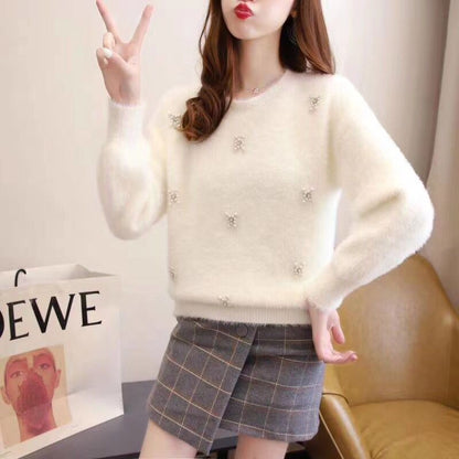 Femmes pull doux avec élégantes appliqués en perles Chic und Stil