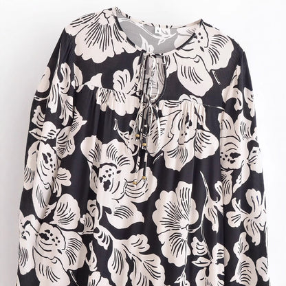 Robe maxi pour femmes avec broderie florale et volants élégants Chic und Stil