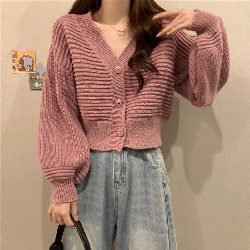 Cardigan en tricot confortable et élégant pour femmes avec des manches volumineuses et des détails de boutons Chic und Stil