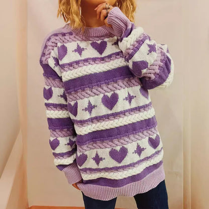 Pull en gros tricot pour femmes avec un motif de cœur ludique et des détails en torsades Chic und Stil