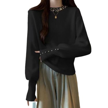 Dames pull élégant avec des détails ornés de perles Chic und Stil
