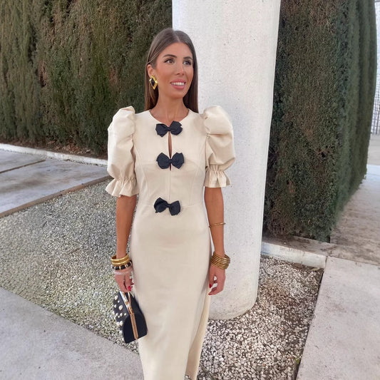 Dames Robe maxi élégante avec détail de nœud unique et conception à manches bouffantes Chic und Stil